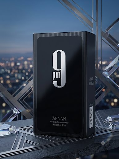 Afnan 9 PM presentation box against a blue city skyline